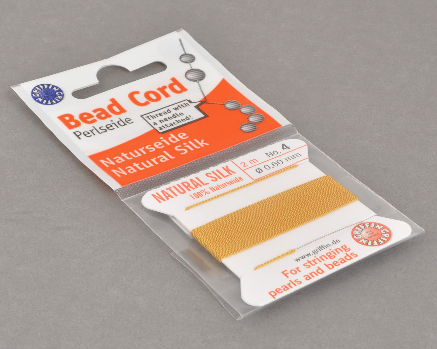 Griffin natural silk bead cord size 4 amber with attached twisted needle 2 meter card