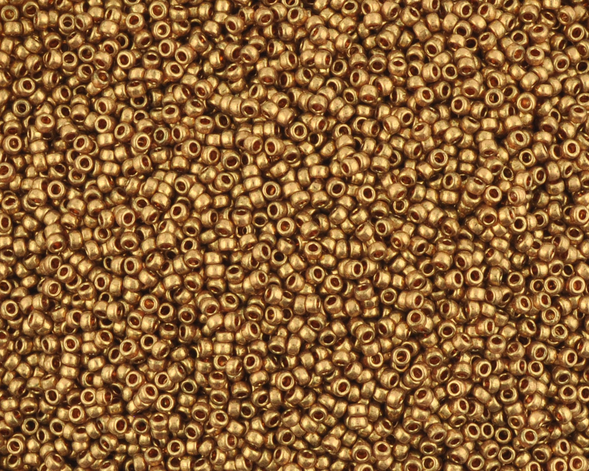 Miyuki 15/0 round seed beads in 457L metallic light bronze, 7 gram tube