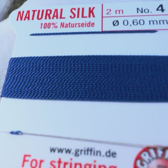 Griffin natural silk bead cord size 4 dark blue with attached twisted needle 2 meter card