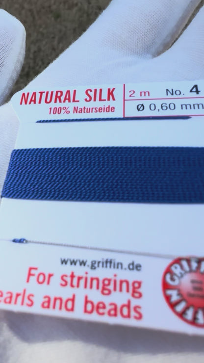 Griffin natural silk bead cord size 4 dark blue with attached twisted needle 2 meter card