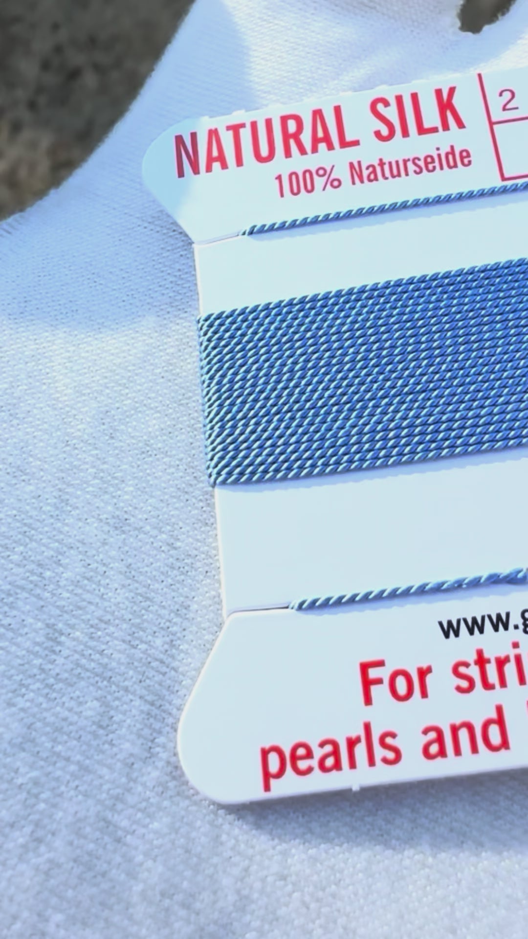 Griffin natural silk bead cord size 4 blue with attached twisted needle 2 meter card