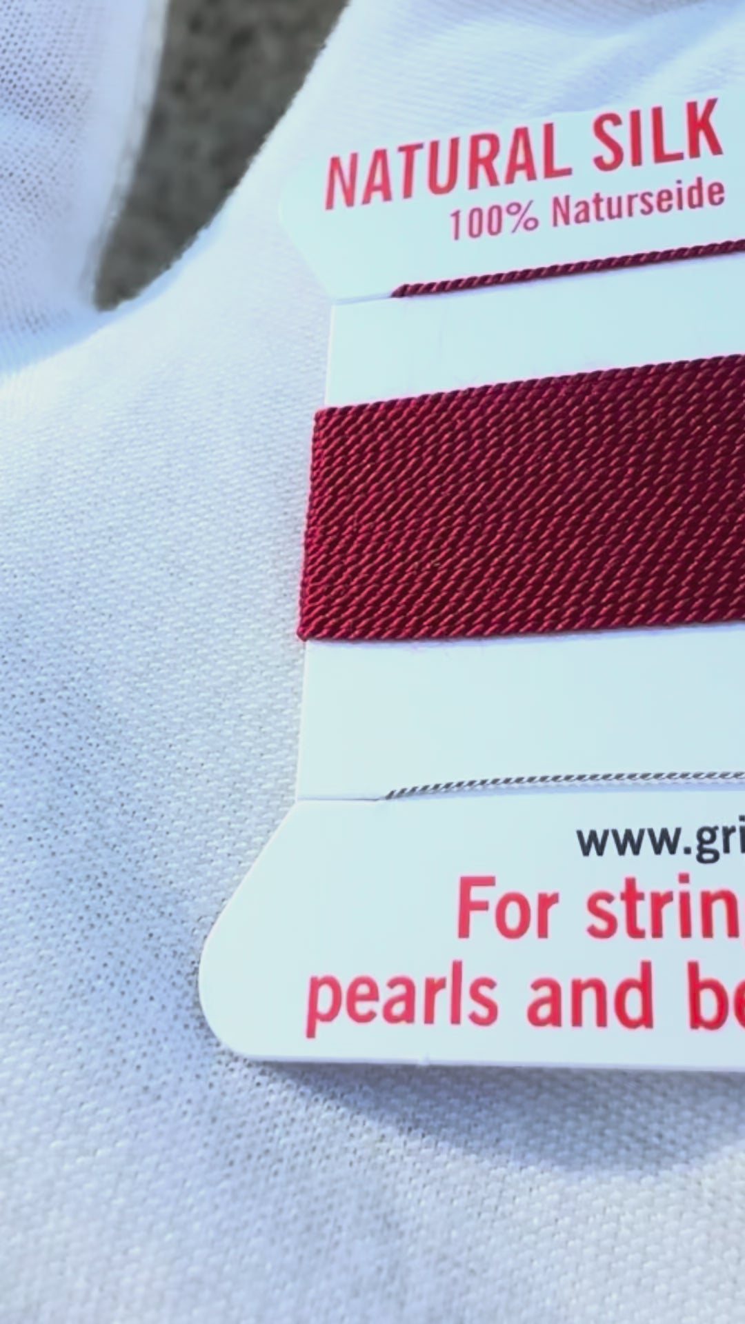 Griffin natural silk bead cord size 4 garnet with attached twisted needle 2 meter card