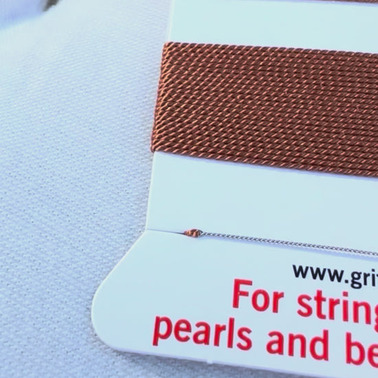 Griffin natural silk bead cord size 4 cornelian with attached twisted needle 2 meter card