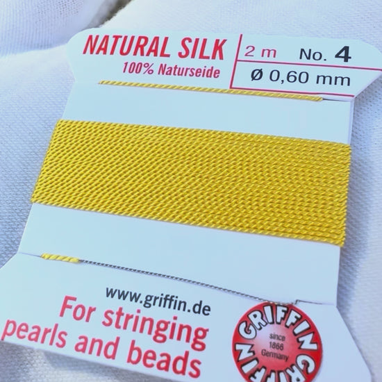 Griffin natural silk bead cord size 4 yellow with attached twisted needle 2 meter card