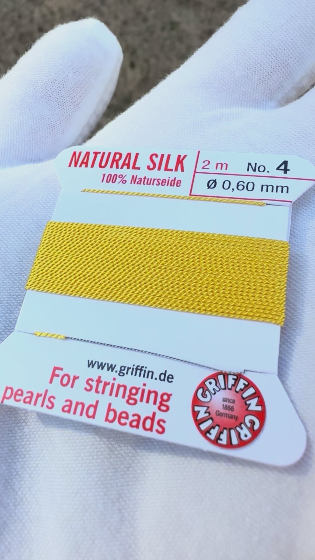 Griffin natural silk bead cord size 4 yellow with attached twisted needle 2 meter card