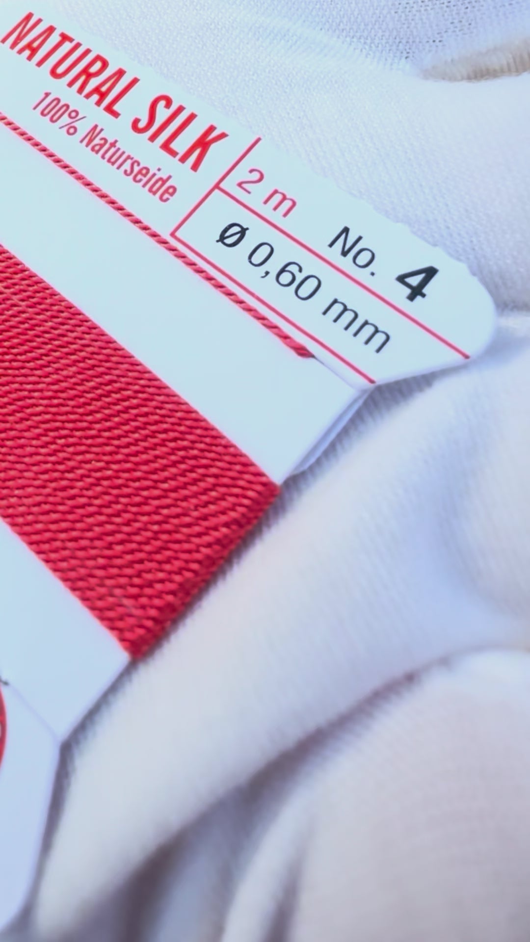 Griffin natural silk bead cord size 4 coral with attached twisted needle 2 meter card