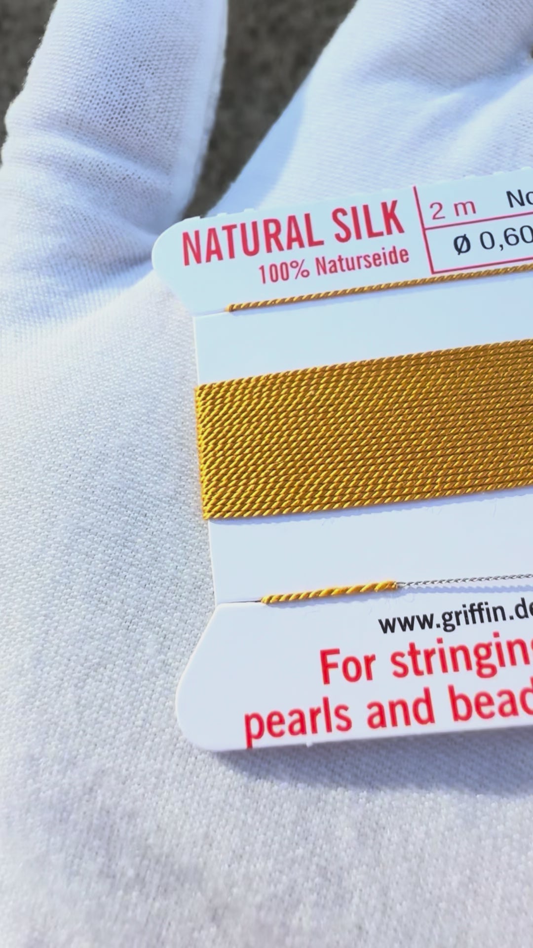 Griffin natural silk bead cord size 4 amber with attached twisted needle 2 meter card